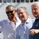 Barack Obama, George W. Bush, and Bill Clinton attending the trophy presentation at the 2017 Presidents Cup held at the Liberty National Golf Club.